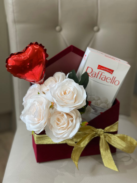 Artificial flower and Raffaelo chocolate envelope gift