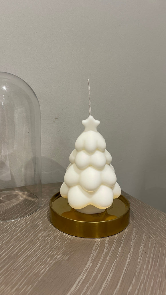 Snowy Christmas candle with star on top